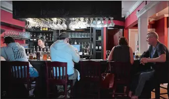  ?? SARAH GORDON/THE DAY ?? Customers sit at the bar at Zavala Mexican Bistro in East Lyme.