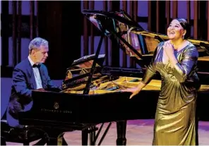  ?? KARLI CADEL ?? Soprano Michelle Bradley and pianist Brian Zeger at a San Diego Opera recital last year. Bradley will return to San Diego to sing the lead role in “Tosca.”