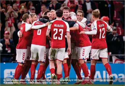  ?? ?? De danske spillere jubler, efter at Danmark med 1-0 over Østrig har spillet sig til VM i Qatar i 2022. I fremtiden kan de komme til at skulle spille VM hvert andet år. Foto: Liselotte Sabroe/Ritzau Scanpix