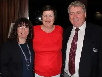  ??  ?? Bunclody lady President Fiona Bodels with her prize-winner, Margaret Moore, and Mick Cowman (President).