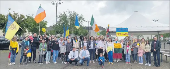  ?? ?? Ukrainians, Lithuanian­s and Irish people gathered in Mitchelsto­wn at the weekly Walk for Peace held each Sunday since the war on Ukraine commenced.