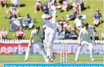  ??  ?? WELLINGTON: India’s Ishant Sharma plays a shot during day four of the first Test cricket match between New Zealand and India at the Basin Reserve in Wellington yesterday. — AFP