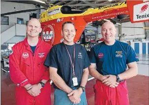  ?? Photo: PETER MEECHAM/FAIRFAX NZ ?? Life savers: Pilot Ron Arrowsmith, flight medic Marcel Driessen and crewman Dean Harvey, who rushed the victim of an accidental shooting to hospital just in time.