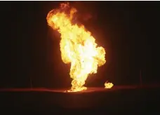  ?? AP ?? Flames rise from a gas pipeline after it exploded outside the city of Borujen, in south-western Iran
