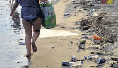  ?? Family Days Tried and Tested ?? > Barry Island beach was left covered in rubbish after the hottest day of the year