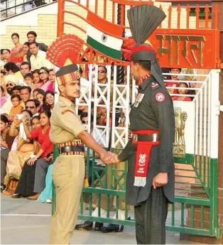  ??  ?? Wagah-border-India-Pakistan ceremony handshake.