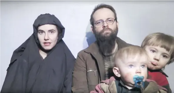  ??  ?? In this image from video released by Taliban Media in December 2016, Caitlan Coleman and Joshua Boyle are seen with their two children. U.S. officials said Pakistan secured the release of Coleman and her husband, who were abducted five years ago in...