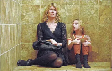  ??  ?? “The Tale” shifts between an adult Fox (Laura Dern) and her 13year-old self (Nélisse) as she confronts the sexual abuse she endured. SUNDANCE INSTITUTE