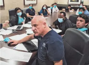  ?? GO NAKAMURA/GETTY IMAGES ?? Dr. Joseph Varon, of Houston’s United Memorial Medical Center, says he fears unvaccinat­ed staff might spread the virus to patients.