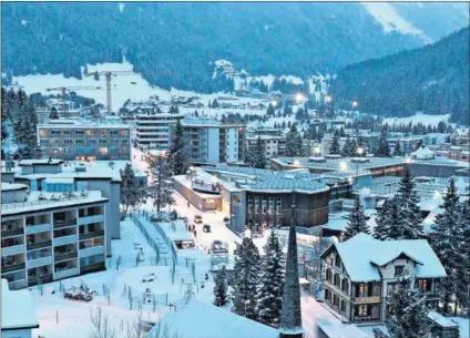  ?? Photo: Michele Limina/Bloomberg ?? Pay back: As world leaders and business executives in Davos begin to get to grips with rising inequality, the Davis Tax Committee is seeking ways to close the gap with Robin Hood taxes .