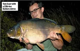  ??  ?? Tom Scarr with a 23lb 4oz Barkers mirror.