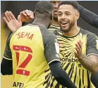  ??  ?? STRIKE ONE Andre Gray celebrates scoring Watford’s first goal