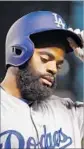  ?? Christian Petersen Getty Images ?? ANDREW TOLES’ sister says Dodgers outfielder looks like a “black hipster, hippie dude.”