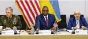  ?? YVES HERMAN / ASSOCIATED PRESS ?? From left, U.S. Chairman of the Joint Chiefs of Staff General Mark Milley, U.S. Defense Secretary Lloyd Austin and Ukraine’s Defense Minister Oleksii Reznikov attend the Ukraine Defense Contact group meeting in Brussels, Wednesday.