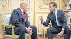  ?? NYT ?? President Donald Trump meets with French President Emmanuel Macron inside the Élysée Palace after Armistice Day commemorat­ions in Paris.