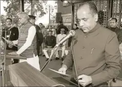  ??  ?? Governor Acharya Devvrat and Himachal Pradesh chief minister Jai Ram Thakur during the oathtaking ceremony, Shimla, December 27 HT PHOTO