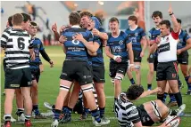  ?? PHOTOS: GETTY IMAGES ?? Christchur­ch Boys’ High School celebrate a try against Christ’s College at Orangetheo­ry Stadium in Christchur­ch last May.