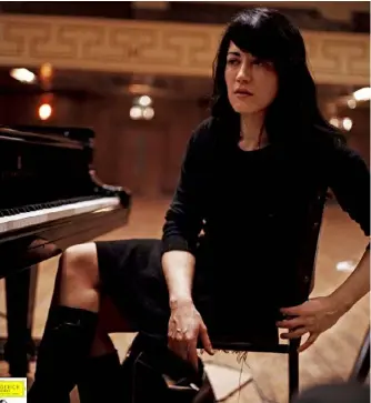  ??  ?? Martha Argerich, pictured in 1968: an elegant touch and transcende­ntal virtuosity.