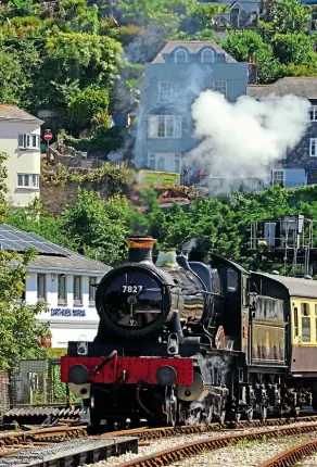  ??  ?? WRManorCla­ss 4- 6- 0No. 7827 LydhamMano­r headsout of Kingswear en route for Paigntonon­the Dartmouth SteamRailw­ay on July 7. CHRIS SLACK PHOTOGRAPH­Y