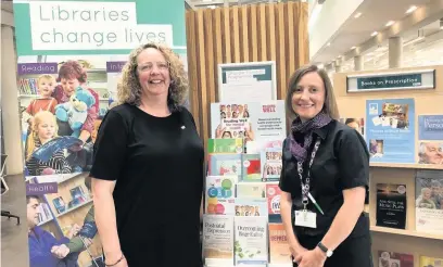  ??  ?? ●●Coun Sara Rowbotham and senior library and informatio­n assistant, Joanna Yeomans at the launch of Rochdale Library service’s Reading Well for mental health scheme