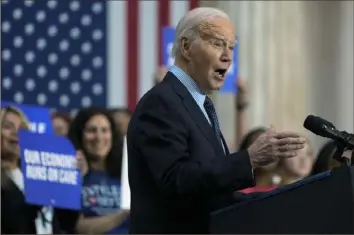  ?? Evan Vucci/Associated Press ?? President Joe Biden delivers remarks during a rally Thursday at Union Station in Washington. His adminstrat­ion has closed a loophole that will force thousands more gun dealers to run background checks on buyers.