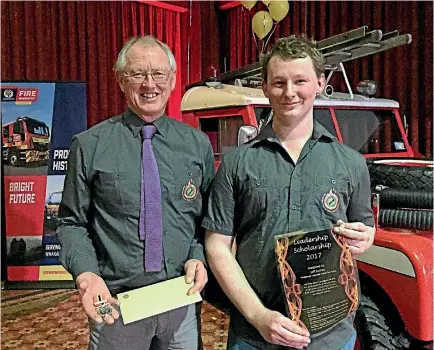  ?? REBECCA MOORE/FAIRFAX NZ 634416563 ?? Hedgehope Rural Fire Force volunteers Rodger Sutton and his son Jeff Sutton at the Southern rural firefighte­r awards.