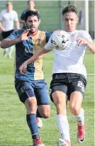  ??  ?? Equaliser EK’s McNeil, left, made it 1-1