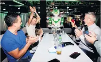  ?? PHOTO: REUTERS ?? Happy birthday, human . . . A robot delivers a birthday cake at Robotazia restaurant in Milton Keynes, Britain, this month.