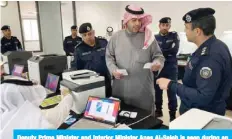  ??  ?? Deputy Prime Minister and Interior Minister Anas Al-Saleh is seen during an inspection tour at the security waivers center in Al-Adan.