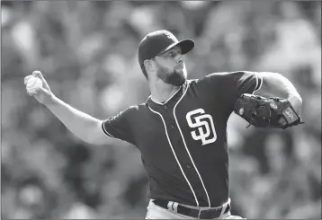  ?? ASSOCIATED PRESS ?? SAN DIEGO PADRES RELIEF PITCHER JORDAN LYLES (27) Saturday in Atlanta. works in the first inning of a baseball game against the Atlanta Braves