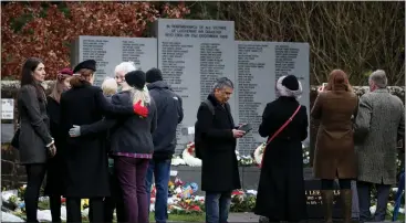  ??  ?? A representa­tive of the Queen was first to lay a tribute during the service at Dryfesdale