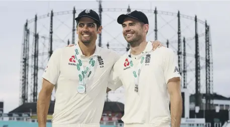  ??  ?? England’s Alastair Cook and James Anderson after yesterday’s victory at The Kia Oval.