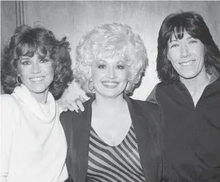  ?? WALLY FONG/AP ?? In this file photo from 1980, Jane Fonda, from left, Dolly Parton and Lily Tomlin get together at a Los Angeles news conference to promote their movie “9 To 5.” Parton’s 1980’s hit song “9 to 5” has been flipped by Squarespac­e, the company that helps users build and host their own websites, for a Super Bowl commercial debuting Feb. 2. Oscar winner Damien Chazelle of “La La Land” fame directed the spot.