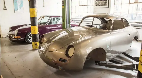  ??  ?? Above: 911s are not the only Porsches that form the basis of a Workshop Seventy7 make-over – we spied this freshly-painted 356 shell ready for ‘reconstruc­tion’