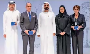  ?? Wam ?? Sheikh Mohammed bin Rashid Al Maktoum with the winners of the MBR excellence awards. —