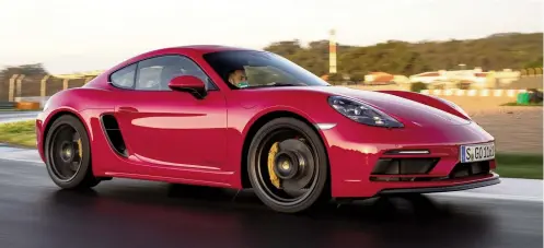  ??  ?? Perversely the advent of electric cars and hybrids in the Porsche range have enabled the return of the normally aspirated flat-six in the Cayman and other enthusiast models
