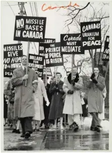  ??  ?? Federal Newsphotos of Canada, Peace protesters at Easter Parade, Toronto, Ont., March 29, 1959, gelatin silver print.