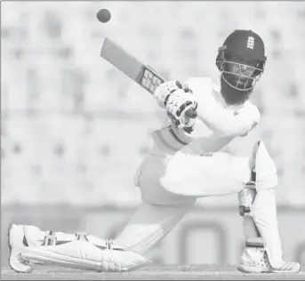  ??  ?? England’s Moeen Ali sweeps on his way to his fifth test century against India at the M A Chidambara­m Stadium, Chennai, India. REUTERS/Danish Siddiqui