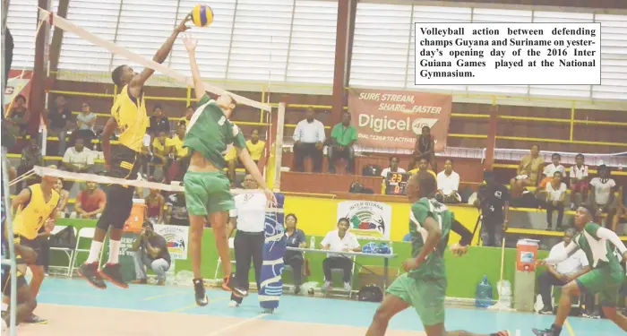  ??  ?? Volleyball action between defending champs Guyana and Suriname on yesterday’s opening day of the 2016 Inter Guiana Games played at the National Gymnasium.