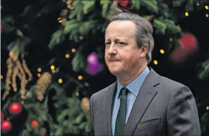  ?? Photo: Leon Neal/getty Images ?? Back to the future: Foreign Secretary David Cameron leaves Downing Street in London, England, this week.