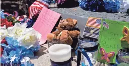  ??  ?? A memorial for DPS Trooper Tyler Edenhofer is pictured on Saturday at the Arizona Department of Public Safety building in Phoenix. Edenhofer was fatally shot on Wednesday.