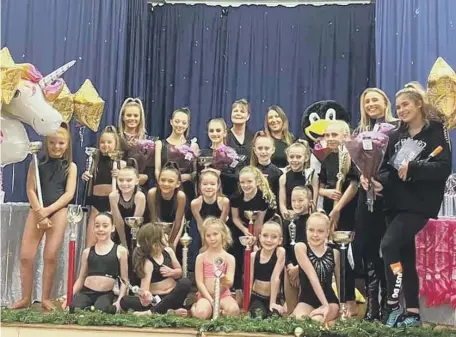  ??  ?? Yvonne Kelly with her students at Chique Academy of Dance. Below, Yvonne and daughter Carla Cundy.