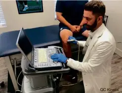  ?? ?? QC Kinetix
Physician’s Assistant performs ultrasound on patient’s knee