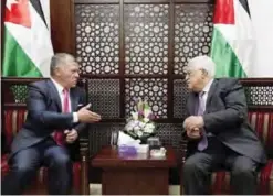 ??  ?? RAMALLAH: Palestinia­n President Mahmoud Abbas (right) meets Jordan’s King Abdullah II at his office in this West Bank city yesterday. — AP
