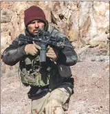  ??  ?? Michael Pena is shown in a scene from “12 Strong.”