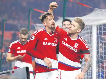  ?? Picture: Reuters ?? MATCH-WINNER. Middlesbro­ugh’s Gaston Ramirez celebrates with Adam Clayton after scoring the game’s only goal during their Premier League match against Hull City at The Riverside on Monday night.