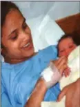  ??  ?? Birth: Zephany with mother