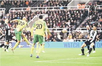  ?? — AFP photo ?? Norwich City’s Teemu Pukki (second left) scores the equalising goal during the English Premier League match against Newcastle United at St James’ Park in Newcastle-upon-Tyne, north east England.