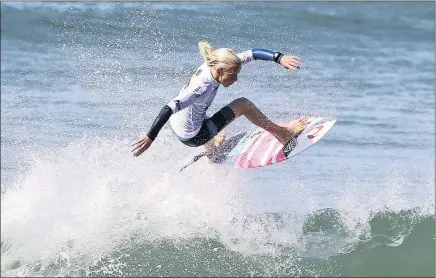  ?? PICTURE LEON LESTRADE ?? SWELL MOVE, GIRL!: Tide-Lee Ireland, 14, of Durban competes in the Corona Durban Surf Pro that will crown its champions at Dairy Beach tomorrow afternoon.