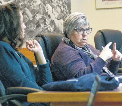  ?? MITCH MACDONALD/THE GUARDIAN ?? Coun. Debbie Johnston, right, speaks during Monday night’s committee of council meeting in Montague. Johnston shared concerns over unbudgeted costs to have new aerial photograph­y completed to update the town’s geographic­al informatio­n system. Also...